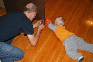 Dad and boy building