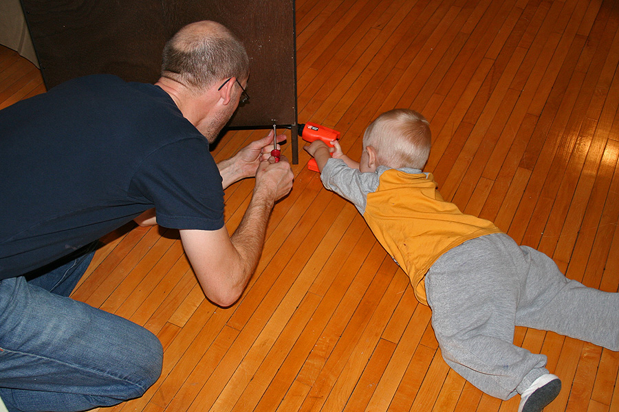 Dad and boy building