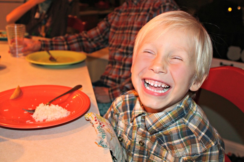 Happy dinner table boy